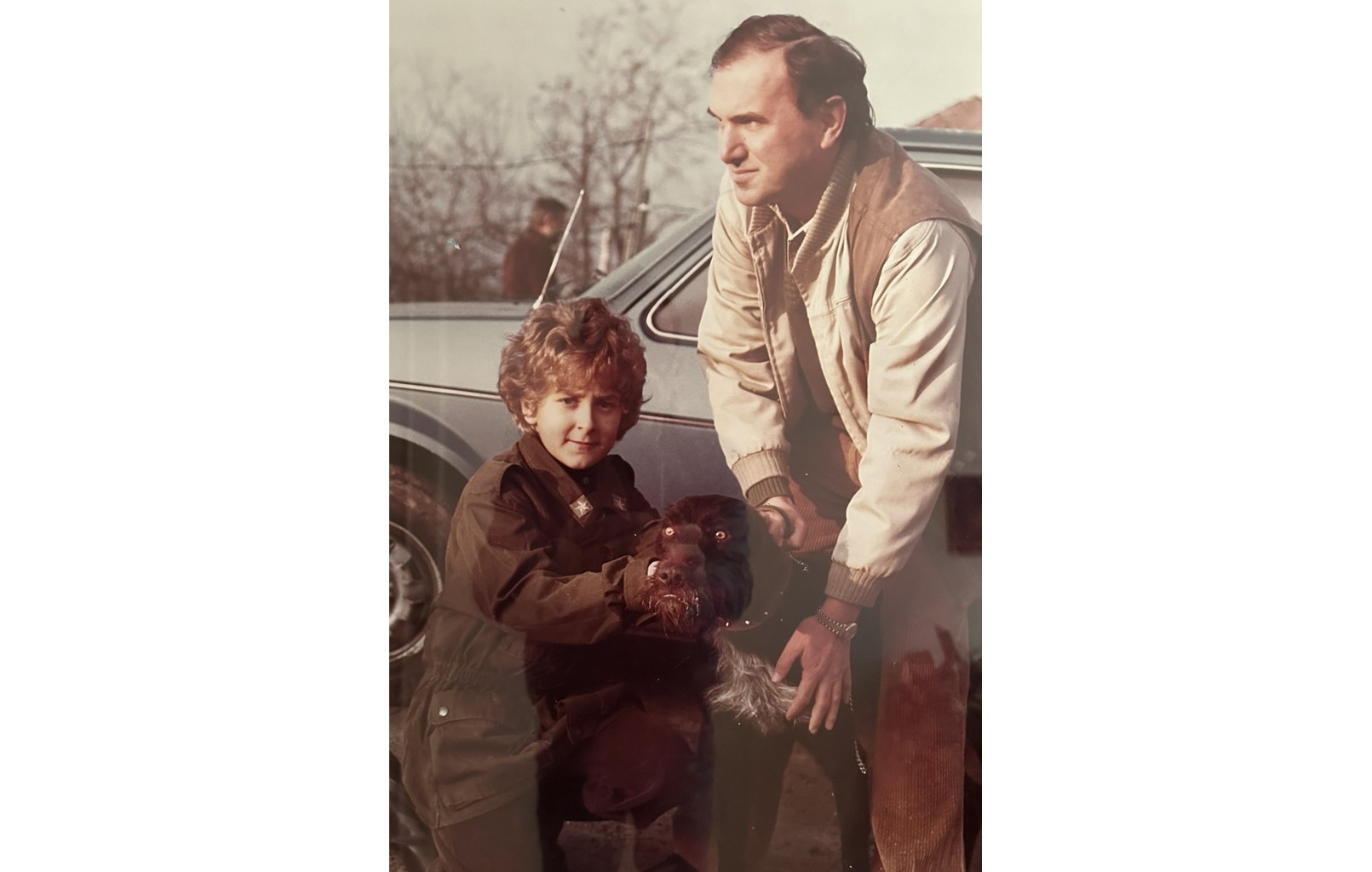 Luca (left) with his father Paolo and their first dog Tobia. 1977